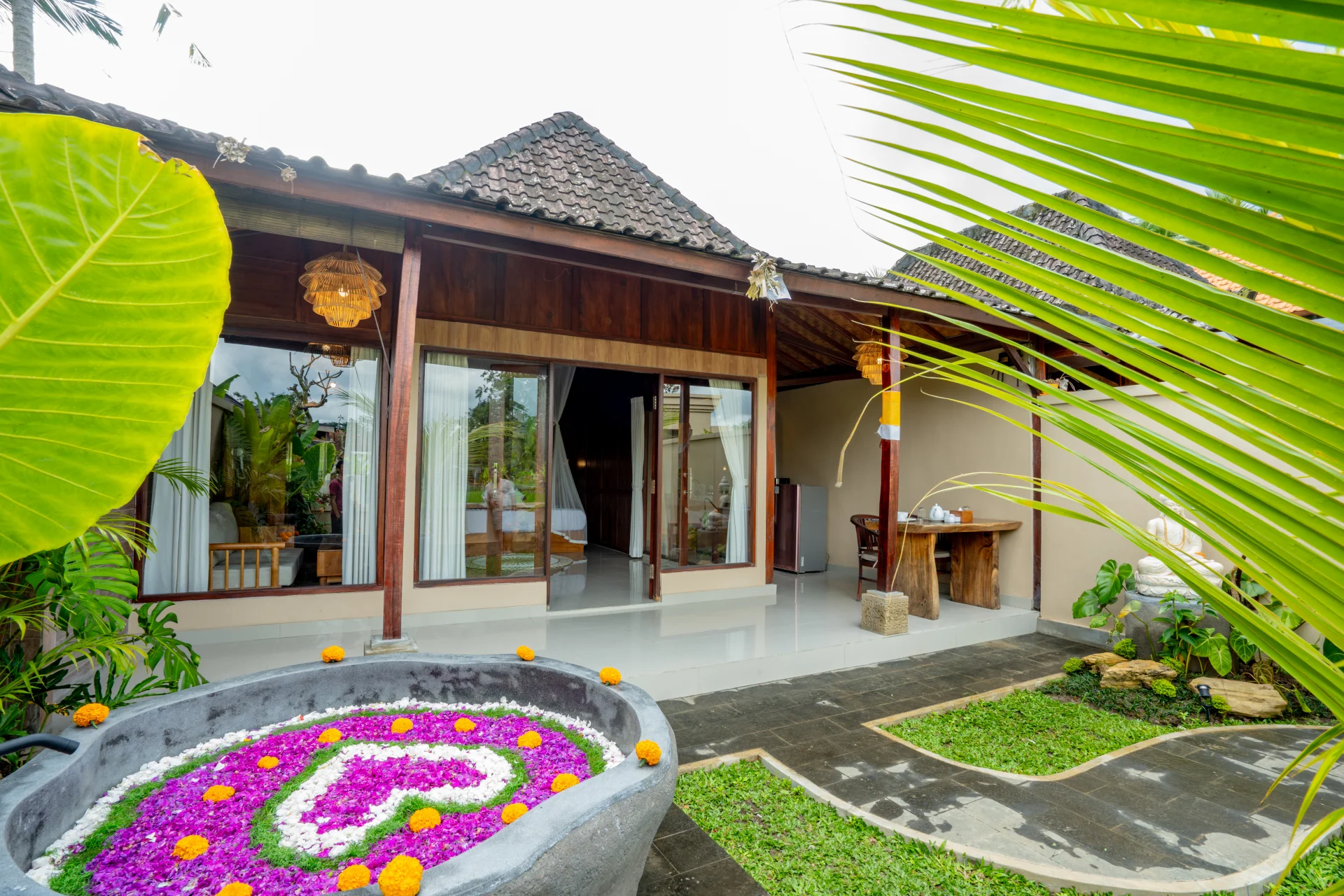 Garden terrace at Insenja Ubud Tropical, a suite villa with hot tub and restaurant in Ubud, Bali